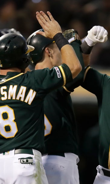 Herrmann grand debut leads Athletics past Twins 8-6